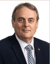 Marcus Burton, Președintele Comitetului Economic